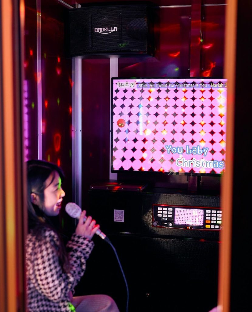 Kono Coin Karaoke Melbourne disco-lit booth.