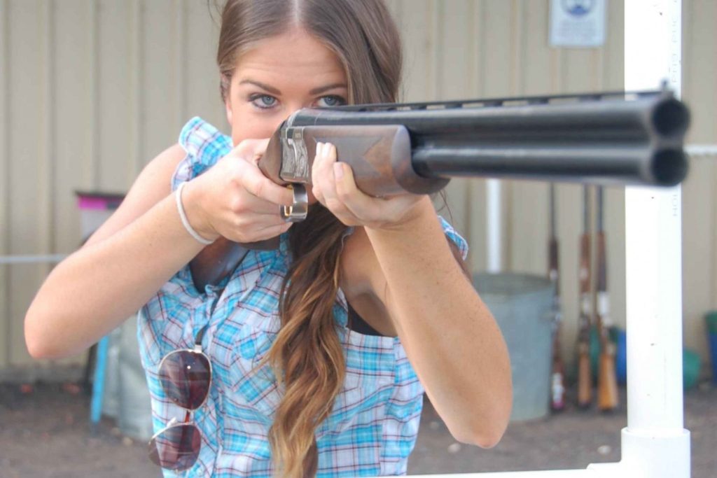 Participants enjoying clay target shooting experience