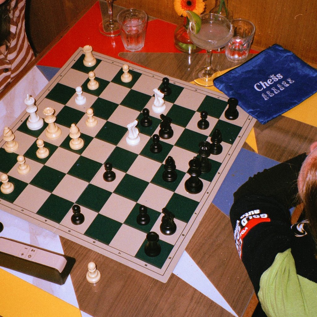 Rooftop chess night at Acid Chess Club with players at Runner Up bar in Collingwood